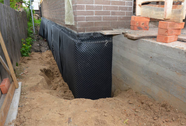 Happy homeowners after waterproofing job in Lockbourne